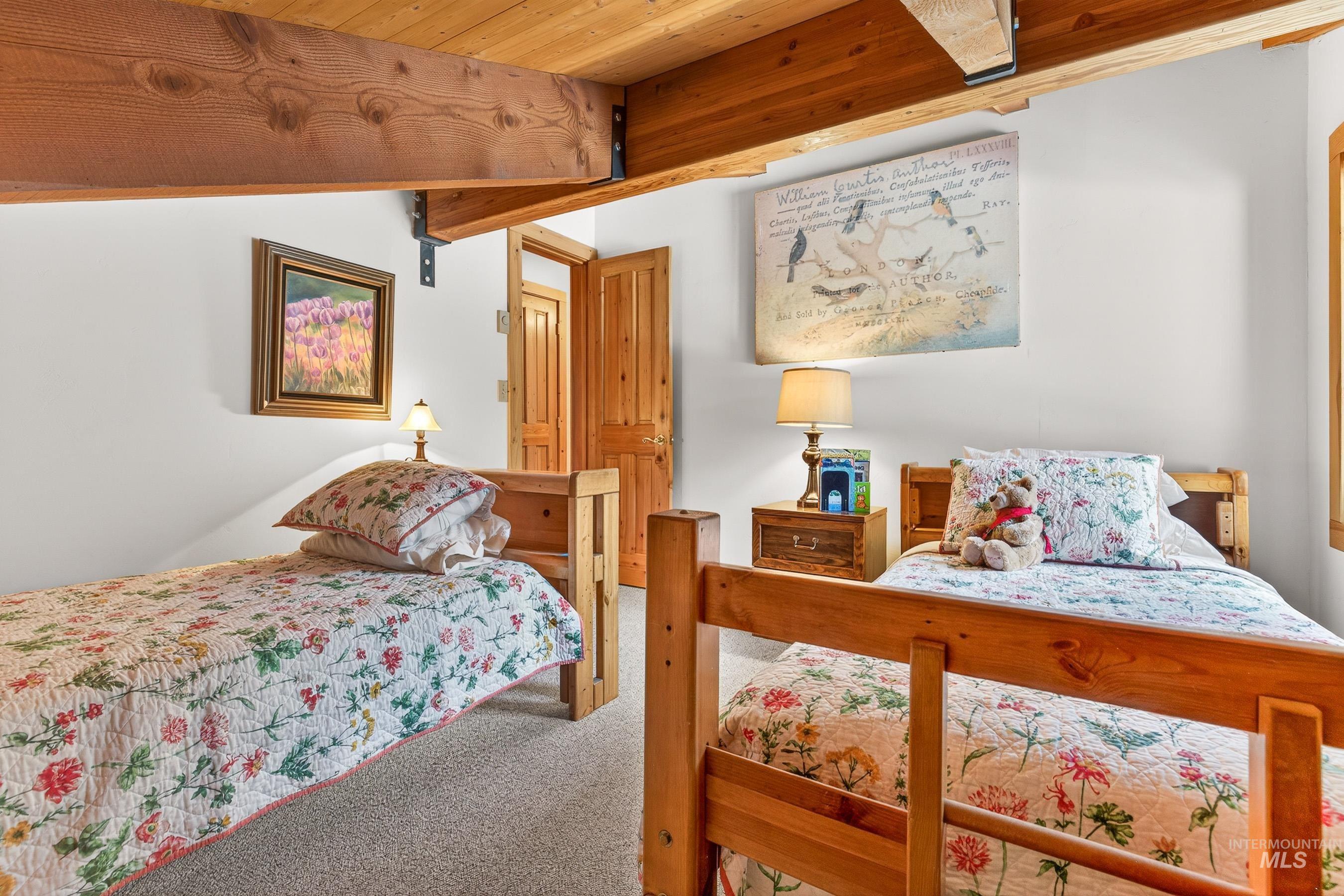 441 Allen Avenue McCall, ID 83638 - Photo 39 of 46 Bedroom featuring carpet and wood ceiling