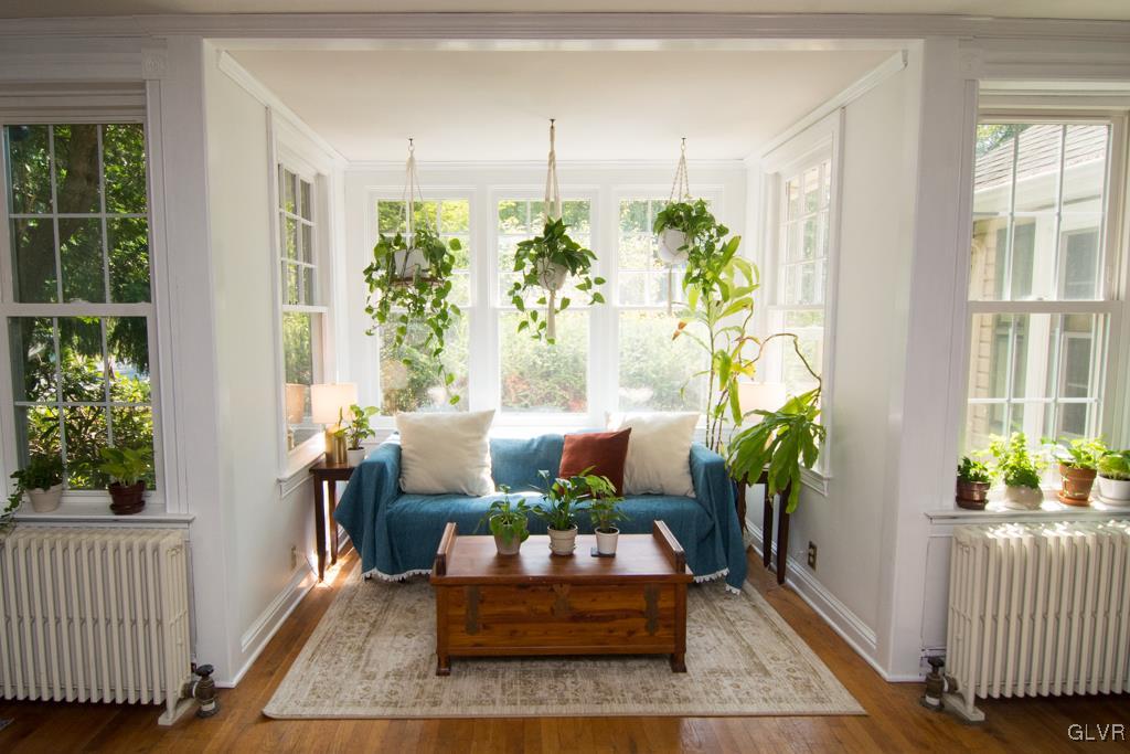 1470 Benner School Road Quakertown, PA 18951 - Photo 14 of 47 a living room with furniture and a potted plant
