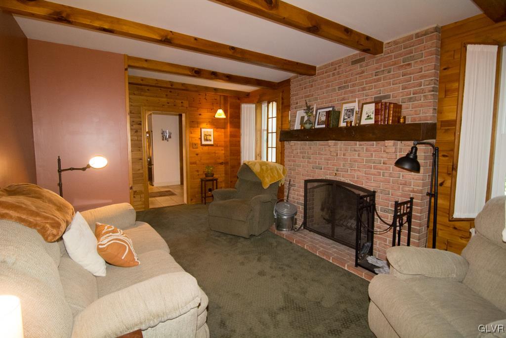 1470 Benner School Road Quakertown, PA 18951 - Photo 17 of 47 a bedroom with furniture and a fireplace