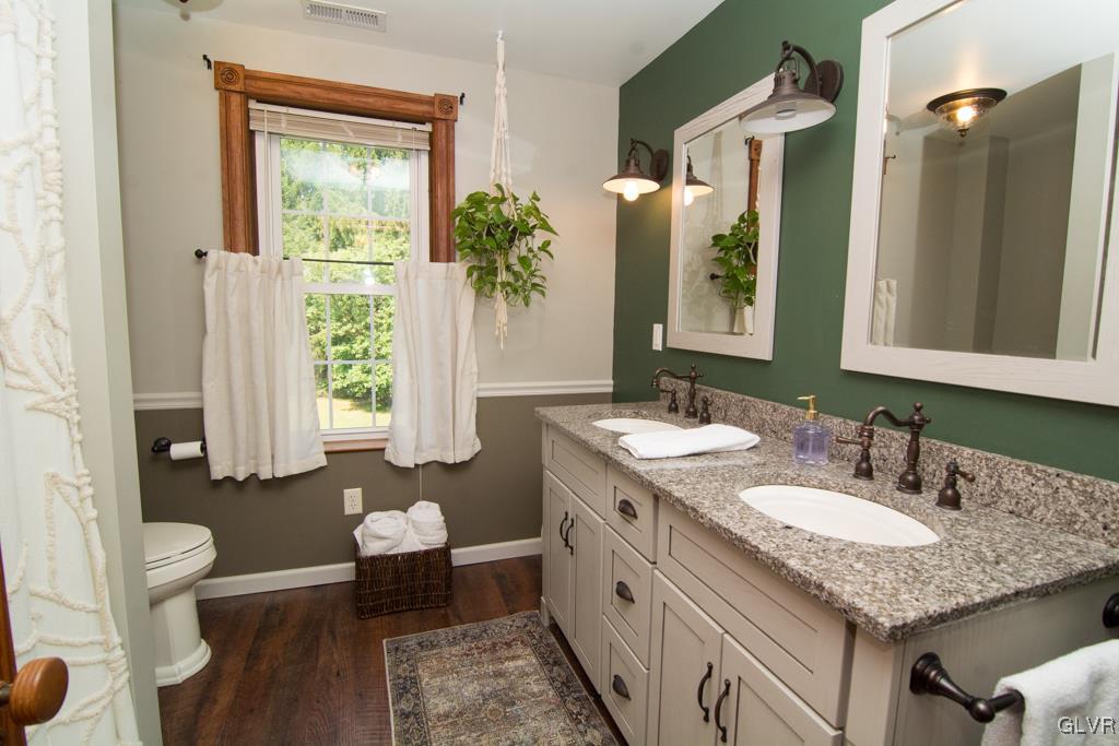 1470 Benner School Road Quakertown, PA 18951 - Photo 25 of 47 a bathroom with a granite countertop sink and a mirror