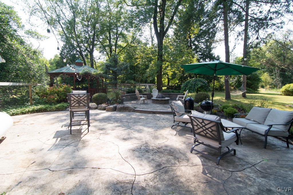 1470 Benner School Road Quakertown, PA 18951 - Photo 30 of 47 a garden view with a seating space