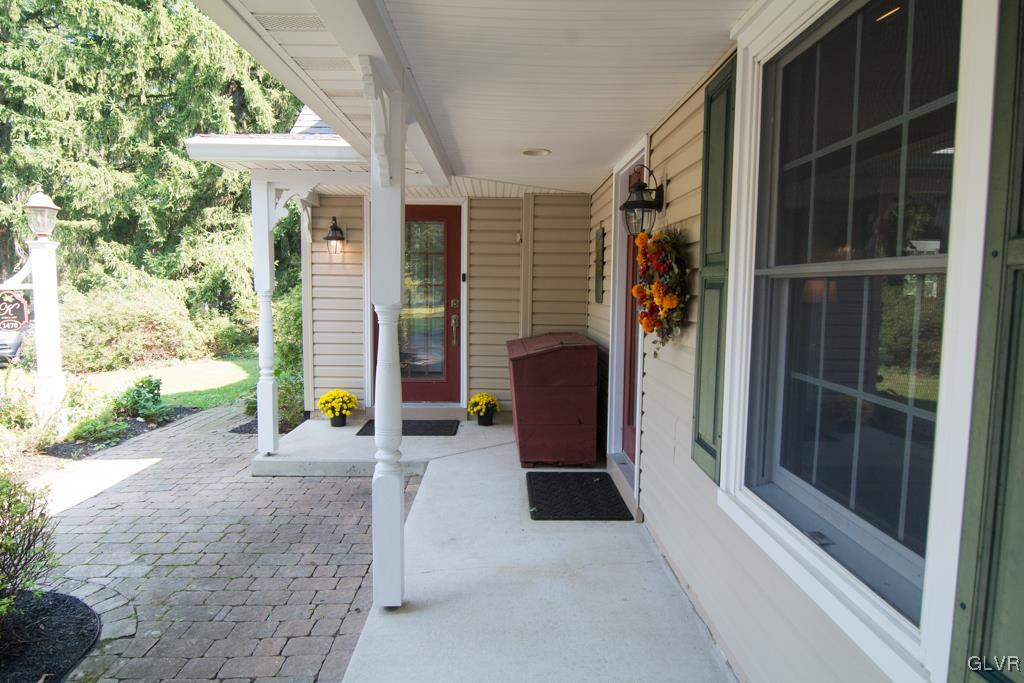 1470 Benner School Road Quakertown, PA 18951 - Photo 3 of 47 a view of an entryway with a door and chair