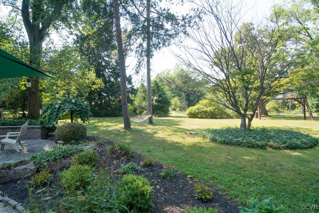 1470 Benner School Road Quakertown, PA 18951 - Photo 33 of 47 a view of backyard with large trees