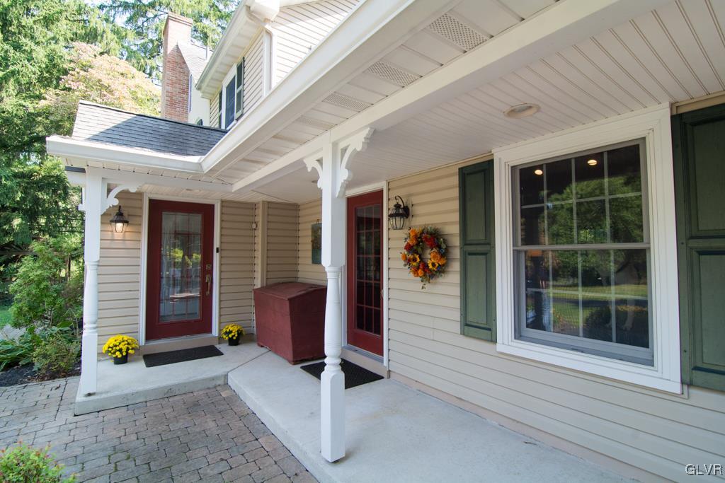 1470 Benner School Road Quakertown, PA 18951 - Photo 4 of 47 a front view of a house with a porch