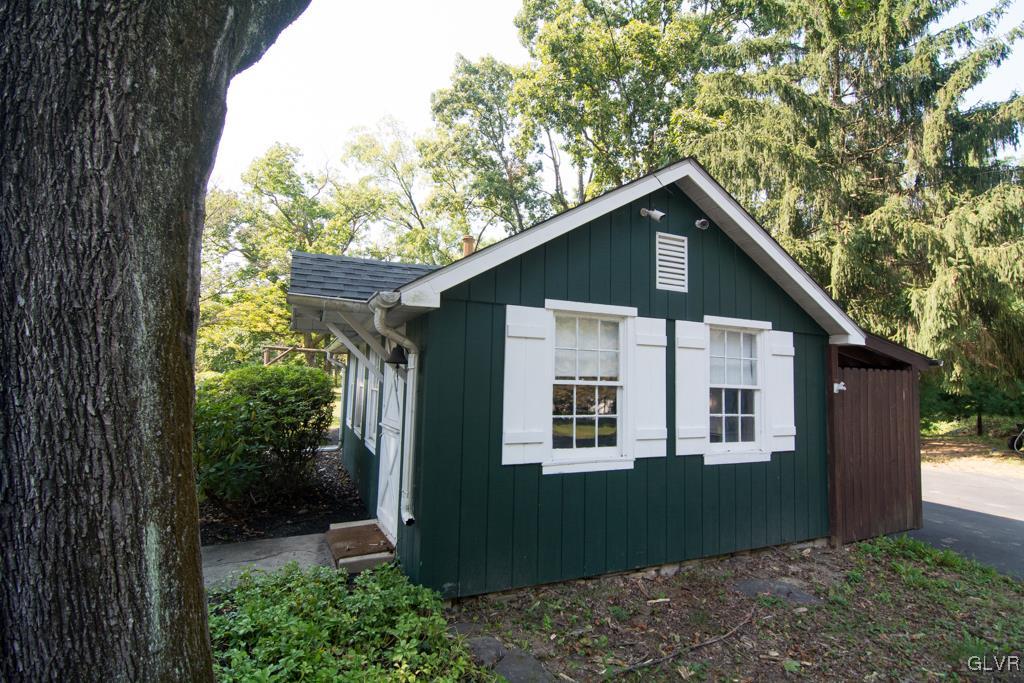 1470 Benner School Road Quakertown, PA 18951 - Photo 42 of 47 a front view of a house with a garden