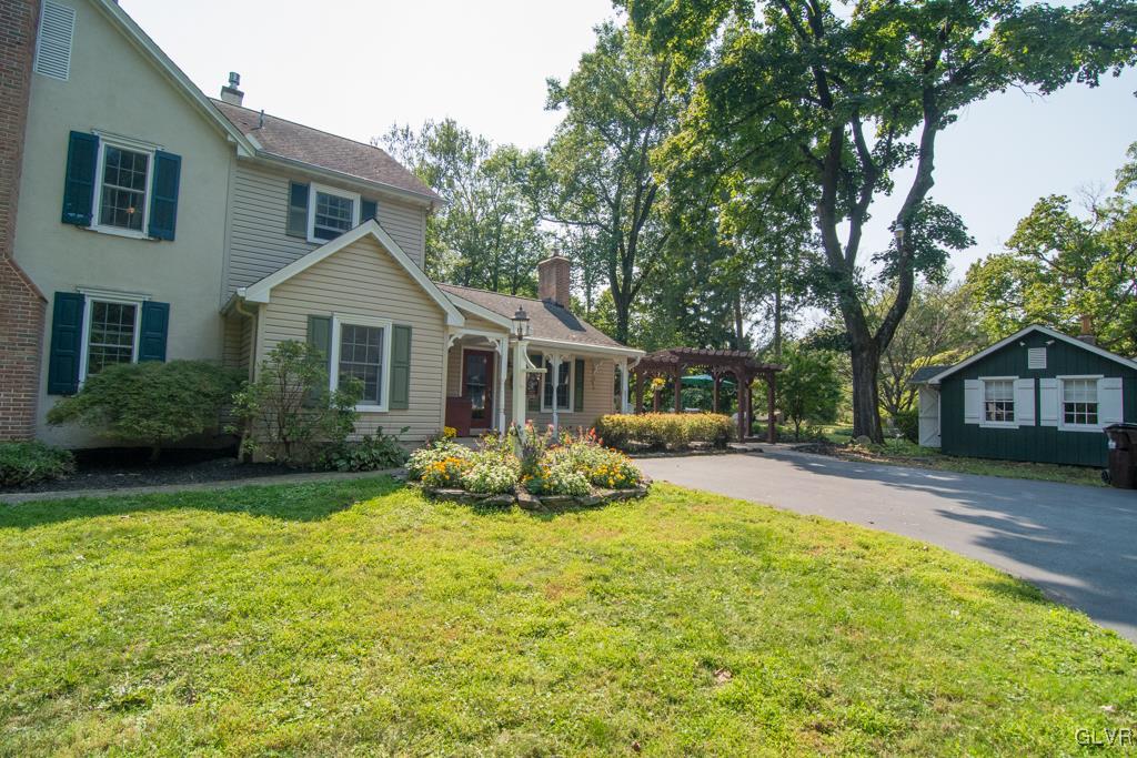 1470 Benner School Road Quakertown, PA 18951 - Photo 47 of 47 a front view of a house with a yard and trees