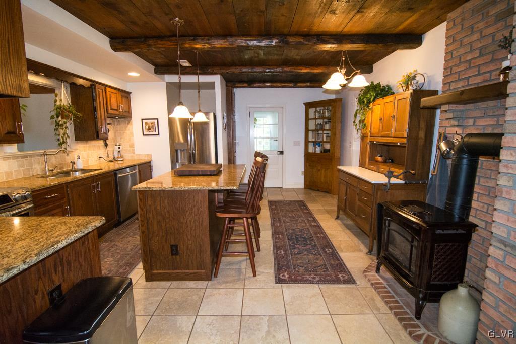 1470 Benner School Road Quakertown, PA 18951 - Photo 8 of 47 a view of a kitchen with granite countertop lots of counter top space