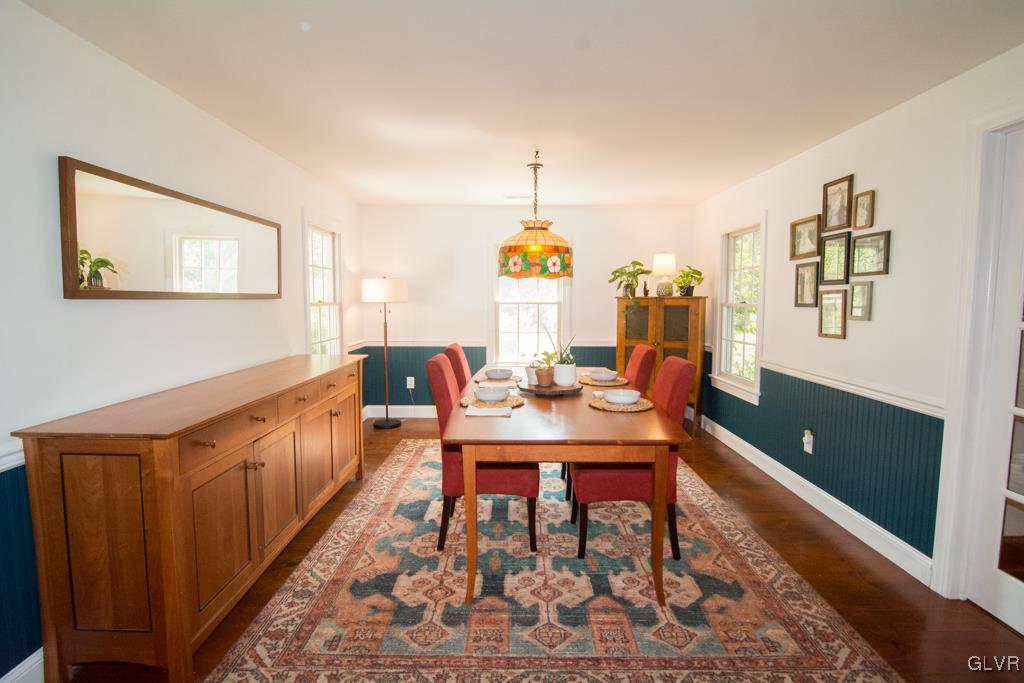 1470 Benner School Road Quakertown, PA 18951 - Photo 9 of 47 a living room with furniture a rug and a chandelier