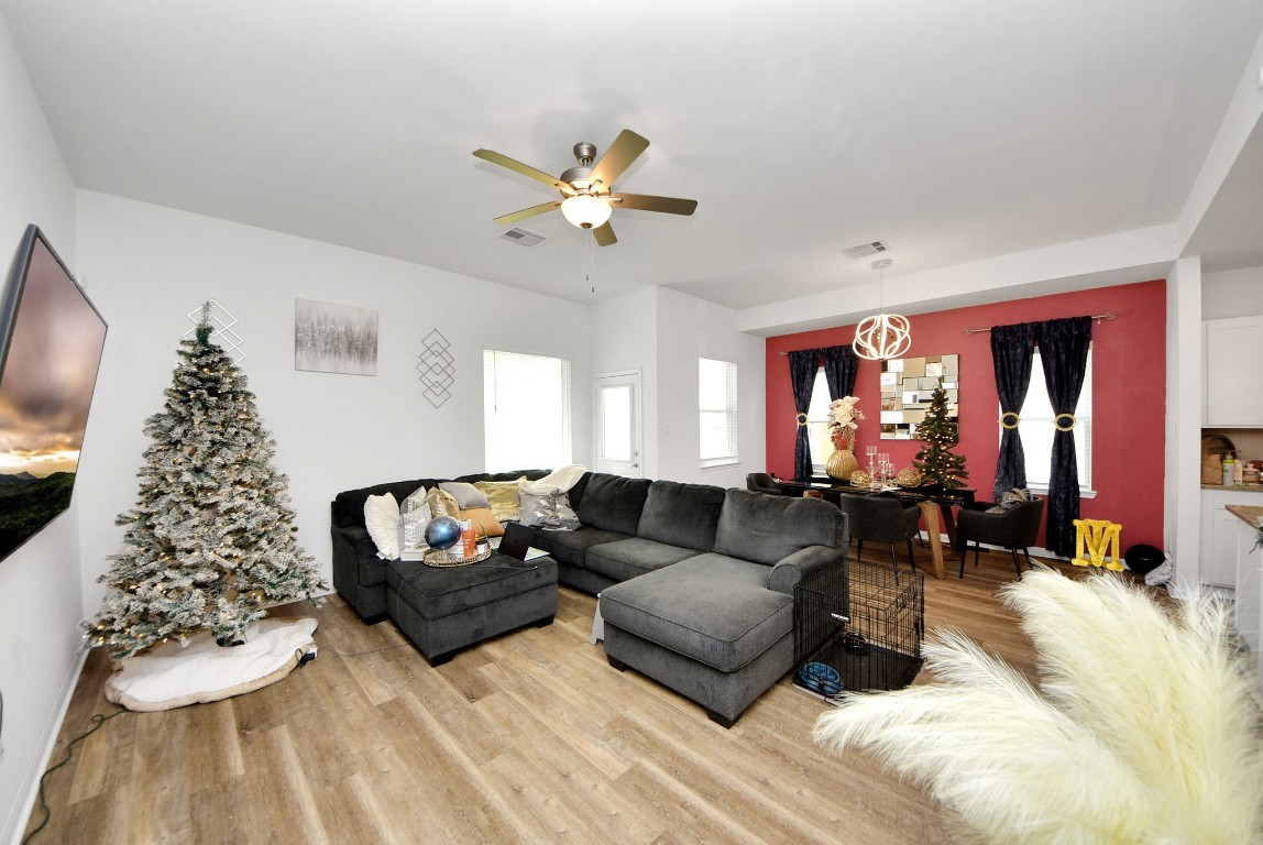 9447 Klein Lane Houston, TX 77044 - Photo 11 of 41 a living room with furniture and wooden floor