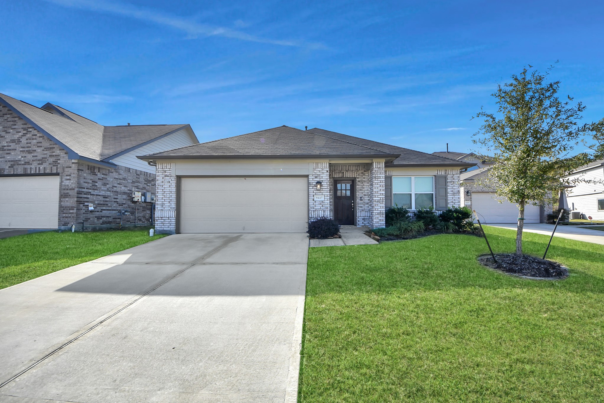 9447 Klein Lane Houston, TX 77044 - Photo 2 of 41 a front view of a house with a yard