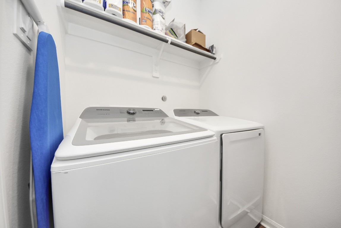 9447 Klein Lane Houston, TX 77044 - Photo 21 of 41 a utility room with dryer and washer