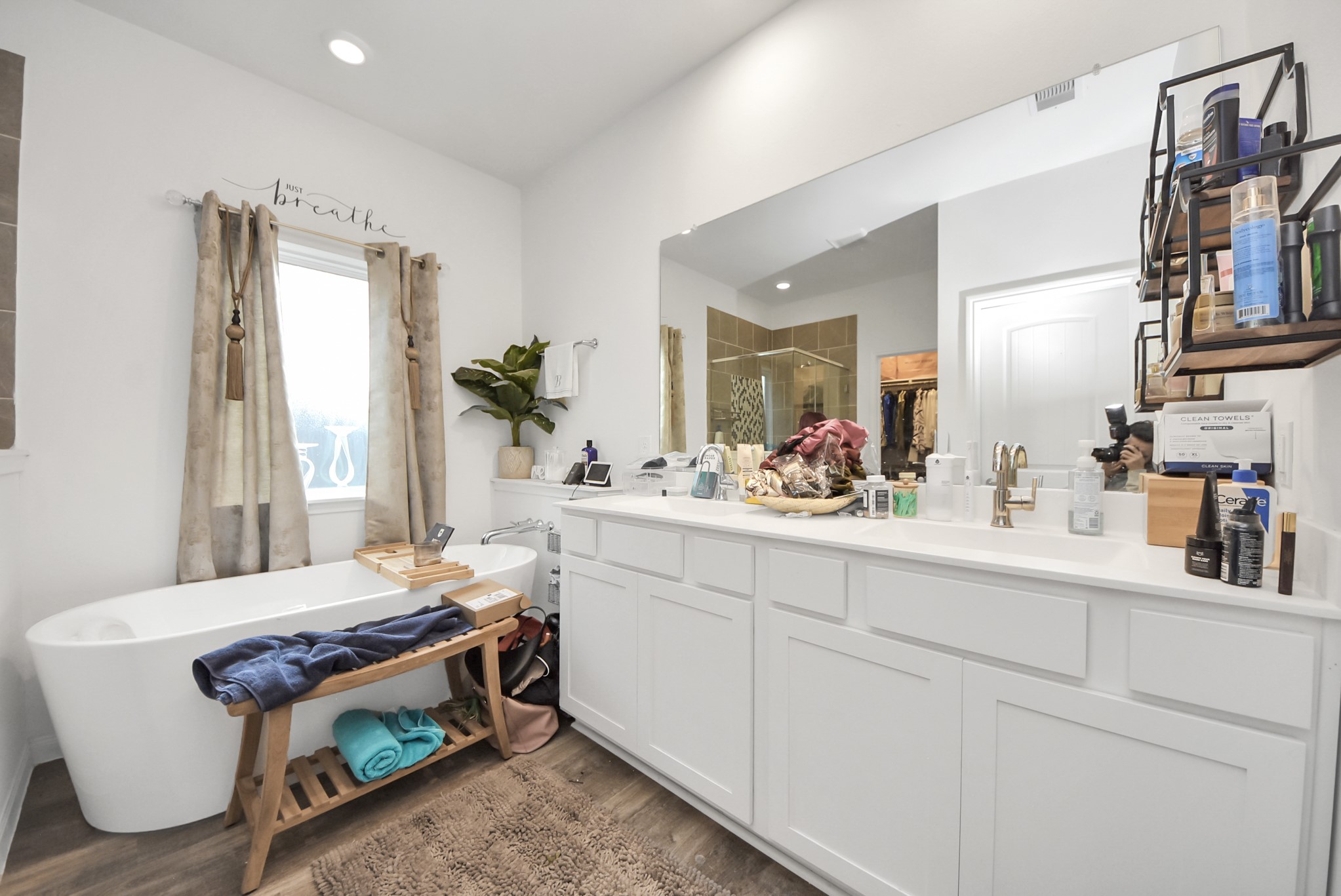 9447 Klein Lane Houston, TX 77044 - Photo 25 of 41 a room with a bed a books bucket with a desk and chair