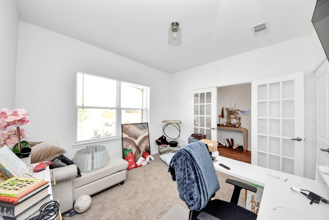 9447 Klein Lane Houston, TX 77044 - Photo 31 of 41 a living room with furniture and a window