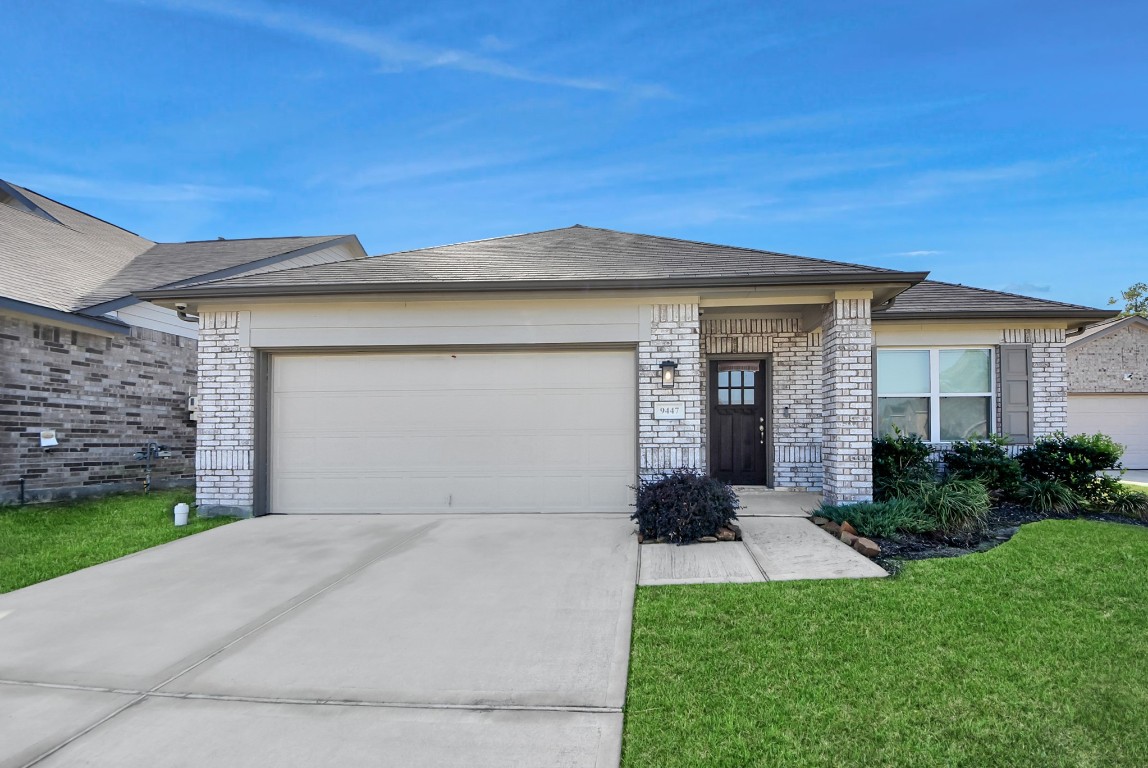 9447 Klein Lane Houston, TX 77044 - Photo 5 of 41 a front view of a house with a yard