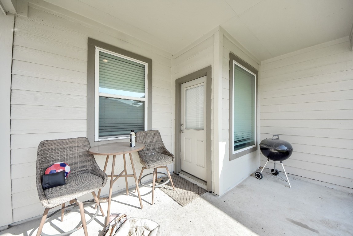 9447 Klein Lane Houston, TX 77044 - Photo 7 of 41 a view of a workspace with furniture and a window