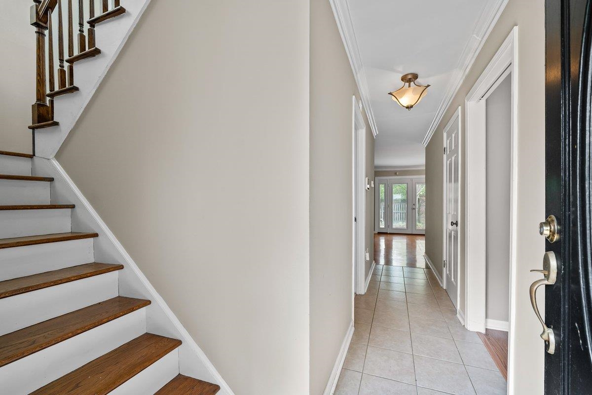 6942 Amberly Road, Unit 6942 Memphis, TN 38119 - Photo 3 of 23 a view of entryway and hall with wooden floor