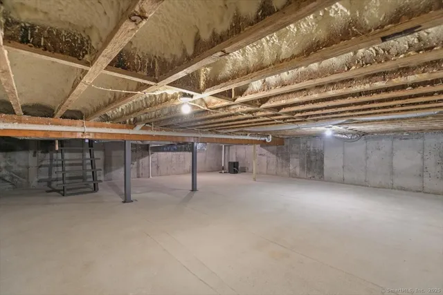a view of backyard with barn and large trees