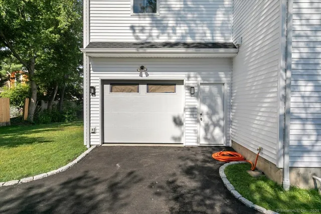 a house view with a garden space