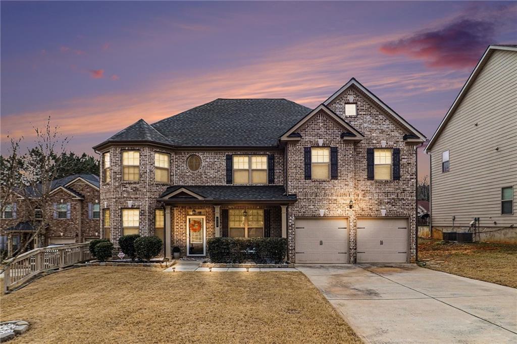 622 Stream Court Fairburn, GA 30213 - Photo 1 of 1 a front view of a house with a yard