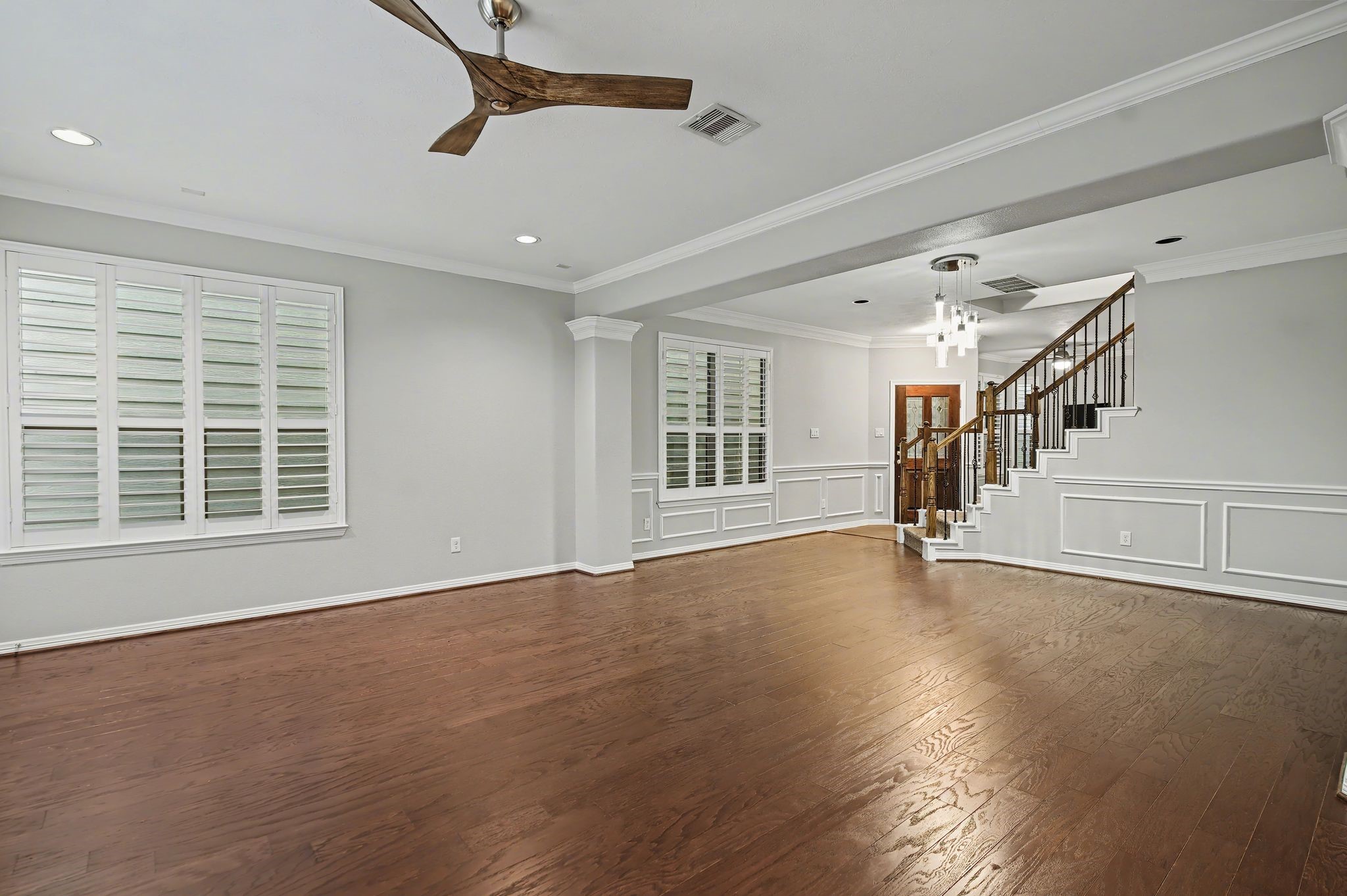 5205 Larkin Street Houston, TX 77007 - Photo 12 of 38 a view of an empty room with wooden floor and a window