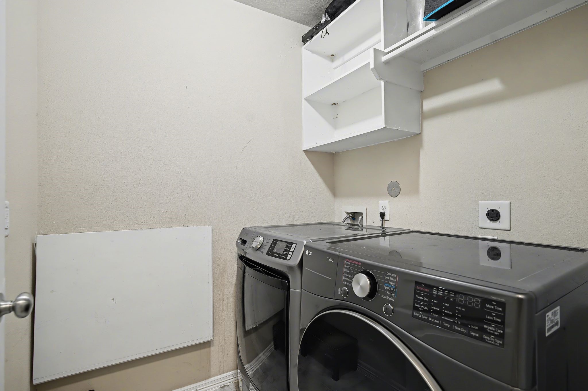 5205 Larkin Street Houston, TX 77007 - Photo 17 of 38 a utility room with dryer and washer