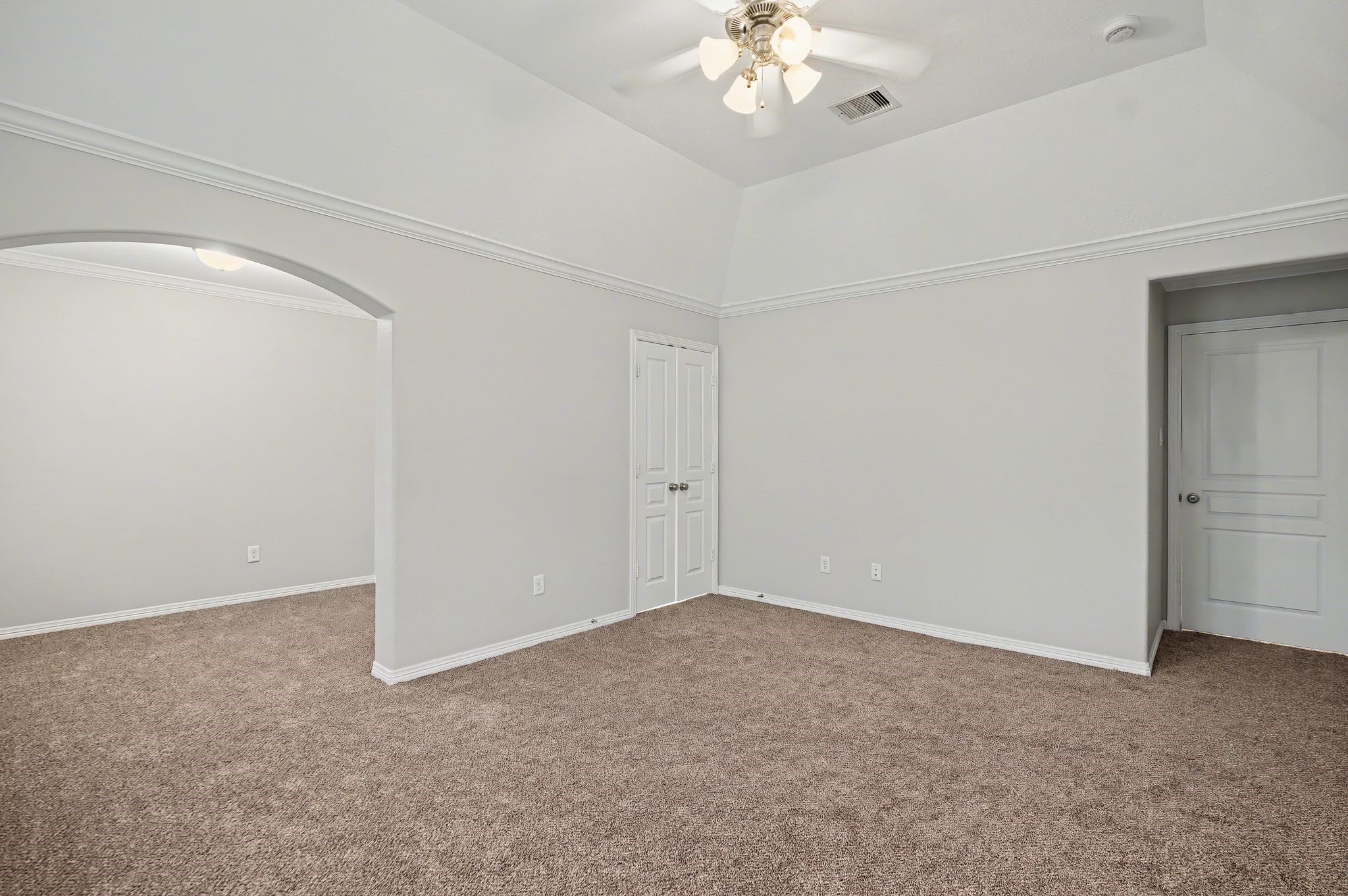 5205 Larkin Street Houston, TX 77007 - Photo 19 of 38 a view of an empty room with a chandelier fan