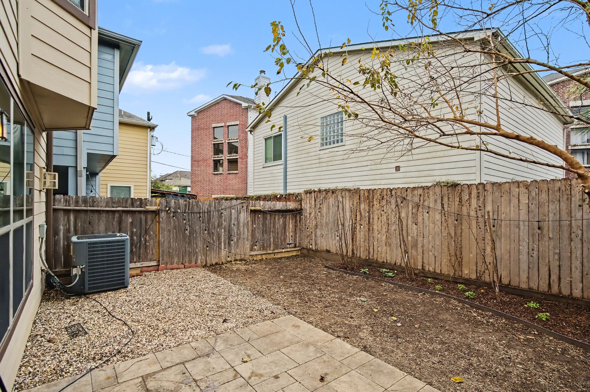 5205 Larkin Street Houston, TX 77007 - Photo 34 of 38 a view of a house with a backyard