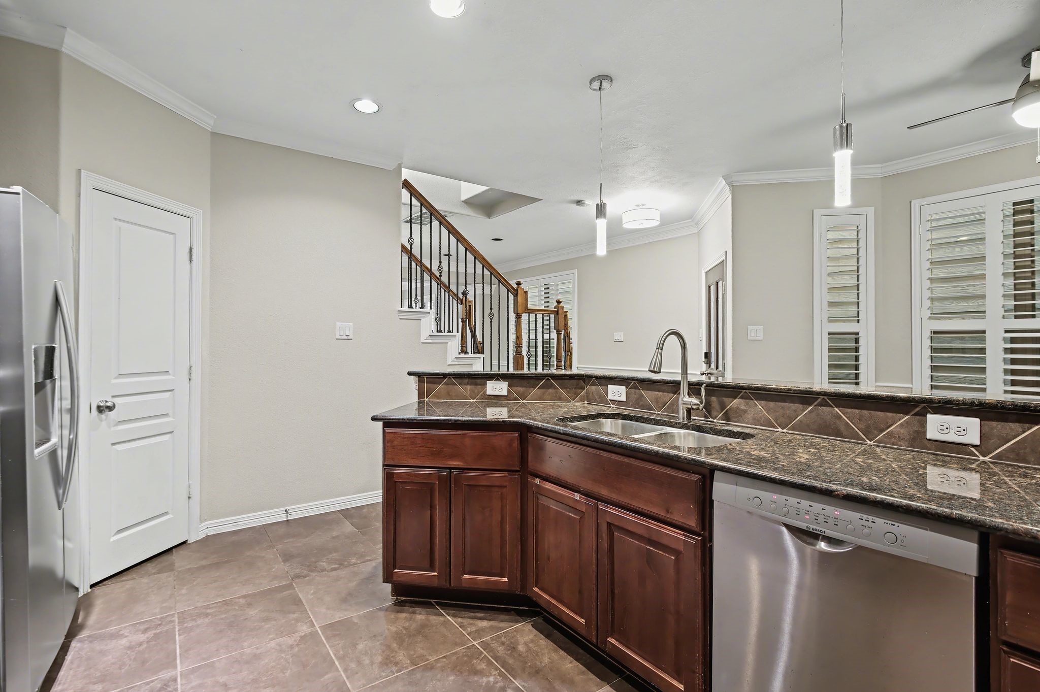 5205 Larkin Street Houston, TX 77007 - Photo 5 of 38 a kitchen with a sink and cabinets