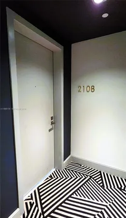 a view of balcony with wooden floor