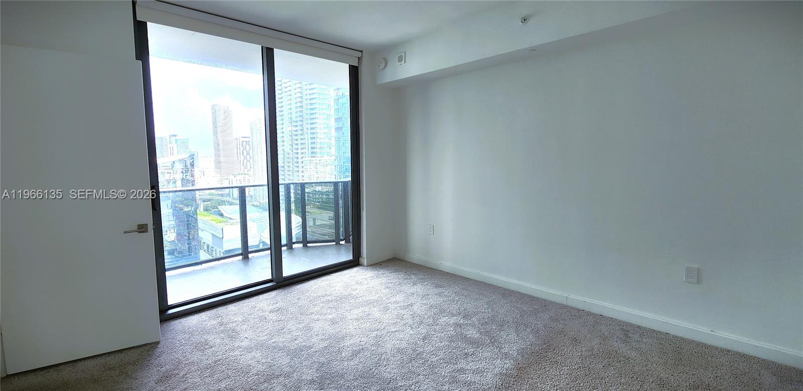 45 Southwest 9th Street, Unit 2108 Miami, FL 33130 - Photo 28 of 55 an empty room with windows