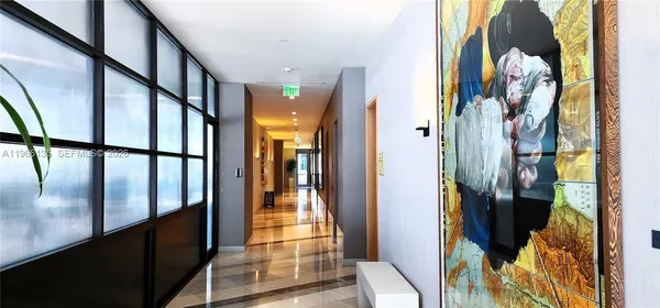 a bathroom with a sink and shower