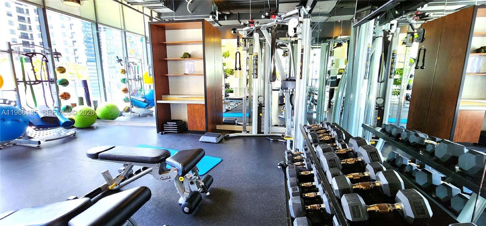 45 Southwest 9th Street, Unit 2108 Miami, FL 33130 - Photo 38 of 55 a view of a livingroom with furniture and a window