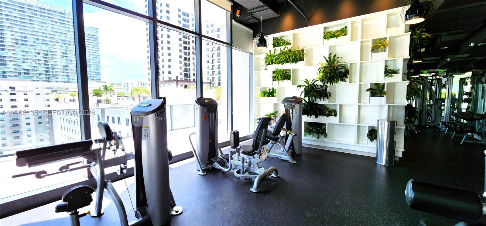 45 Southwest 9th Street, Unit 2108 Miami, FL 33130 - Photo 39 of 55 a view of a room with gym equipment