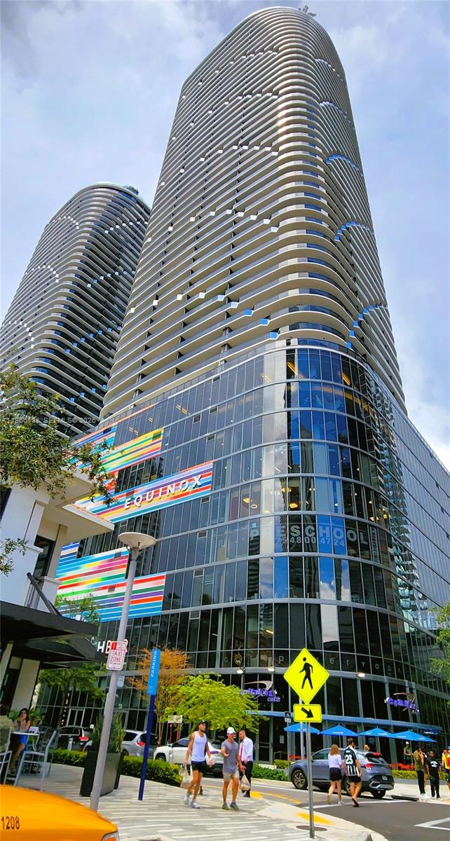 45 Southwest 9th Street, Unit 2108 Miami, FL 33130 - Photo 4 of 55 a front view of building with parking