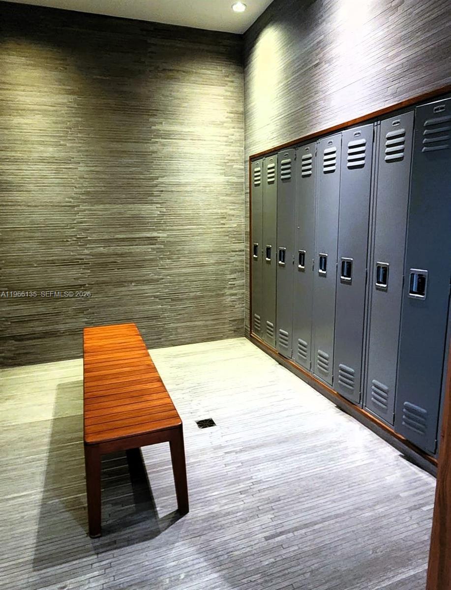 45 Southwest 9th Street, Unit 2108 Miami, FL 33130 - Photo 42 of 55 a bathroom with a sink and shower