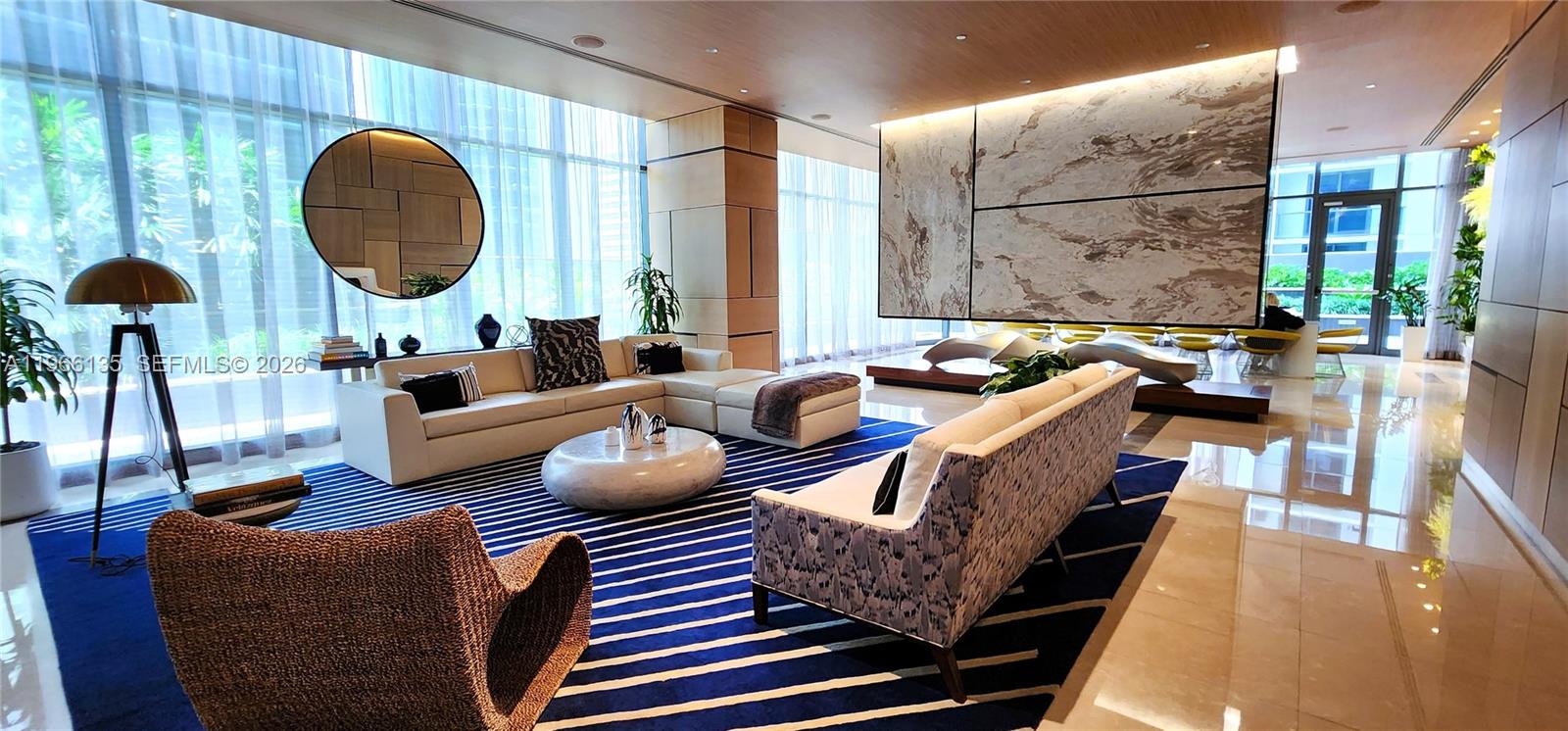 45 Southwest 9th Street, Unit 2108 Miami, FL 33130 - Photo 47 of 55 a living room with furniture and a large window