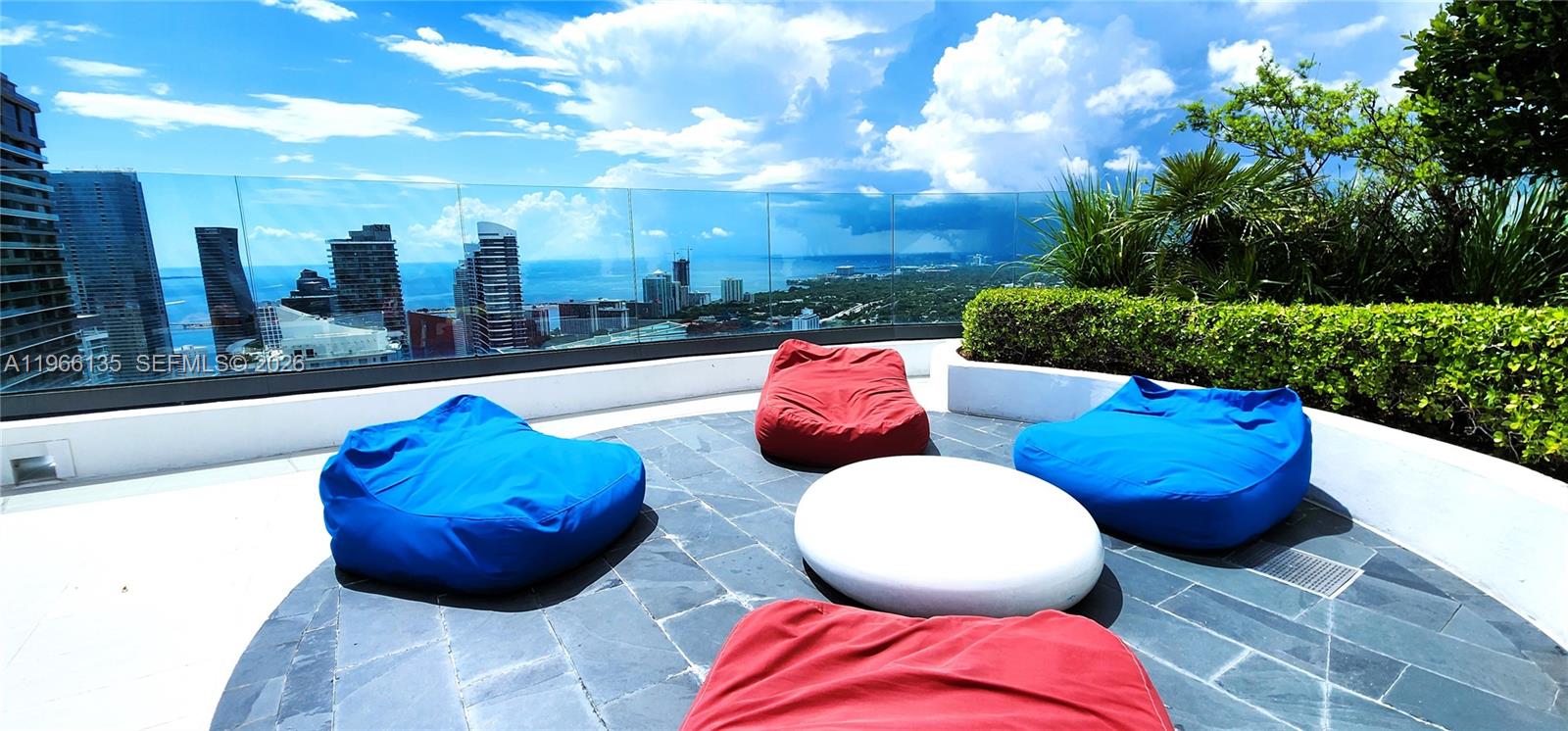 45 Southwest 9th Street, Unit 2108 Miami, FL 33130 - Photo 49 of 55 a outdoor space with furniture and garden view