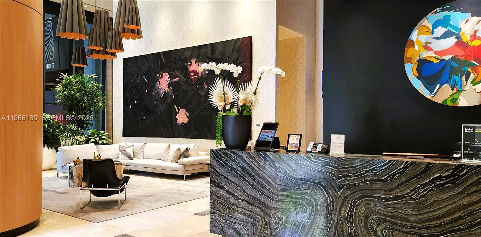 45 Southwest 9th Street, Unit 2108 Miami, FL 33130 - Photo 5 of 55 a living room with furniture and painting on the wall