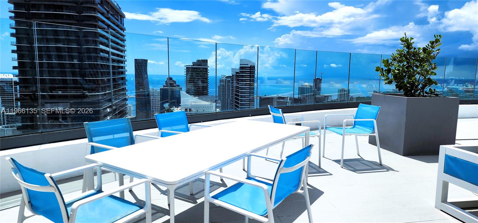 45 Southwest 9th Street, Unit 2108 Miami, FL 33130 - Photo 53 of 55 a view of an outside dining space with furniture