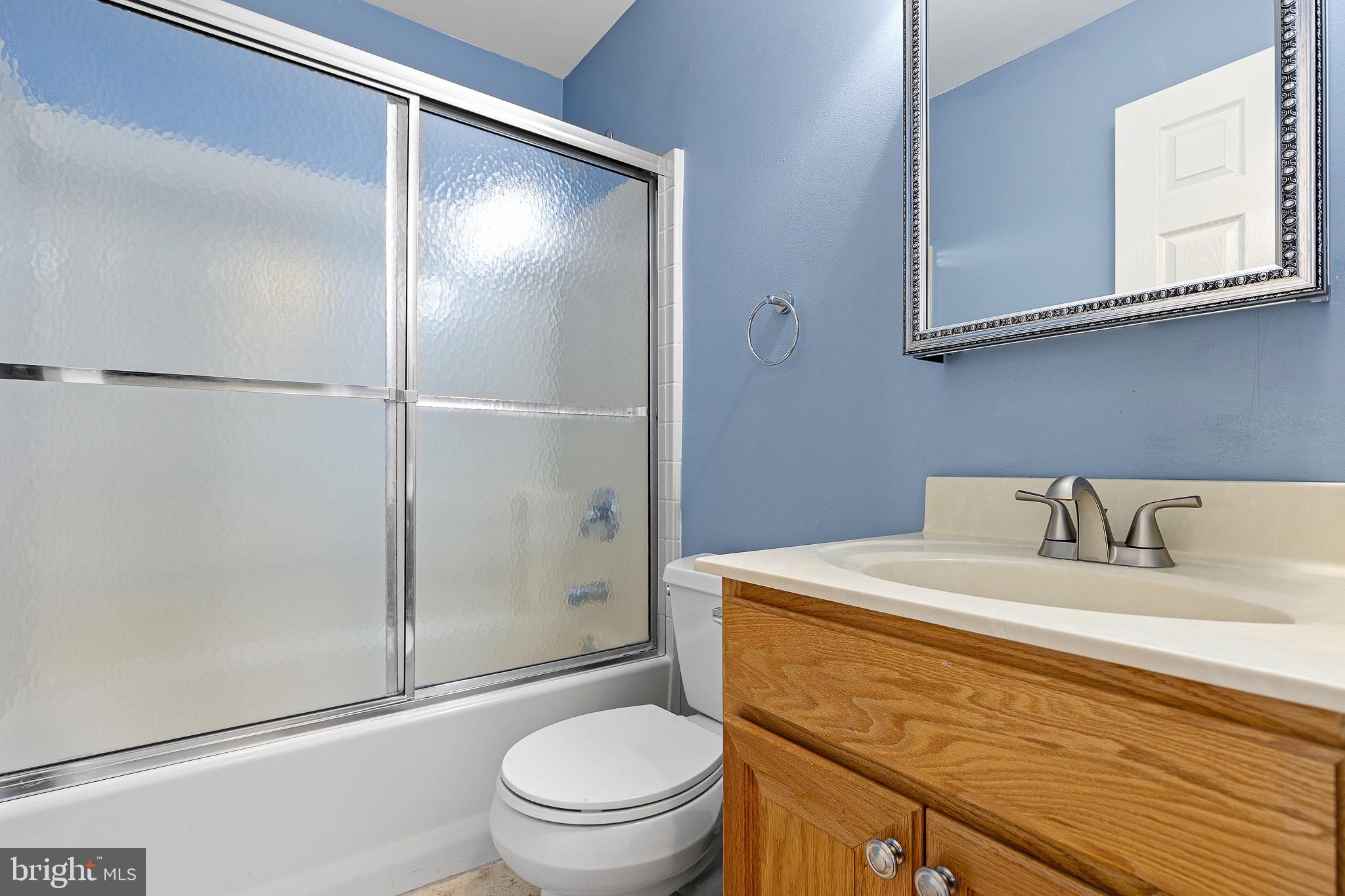 32 Ballina Boulevard Bear, DE 19701 - Photo 24 of 25 a bathroom with a sink toilet and shower