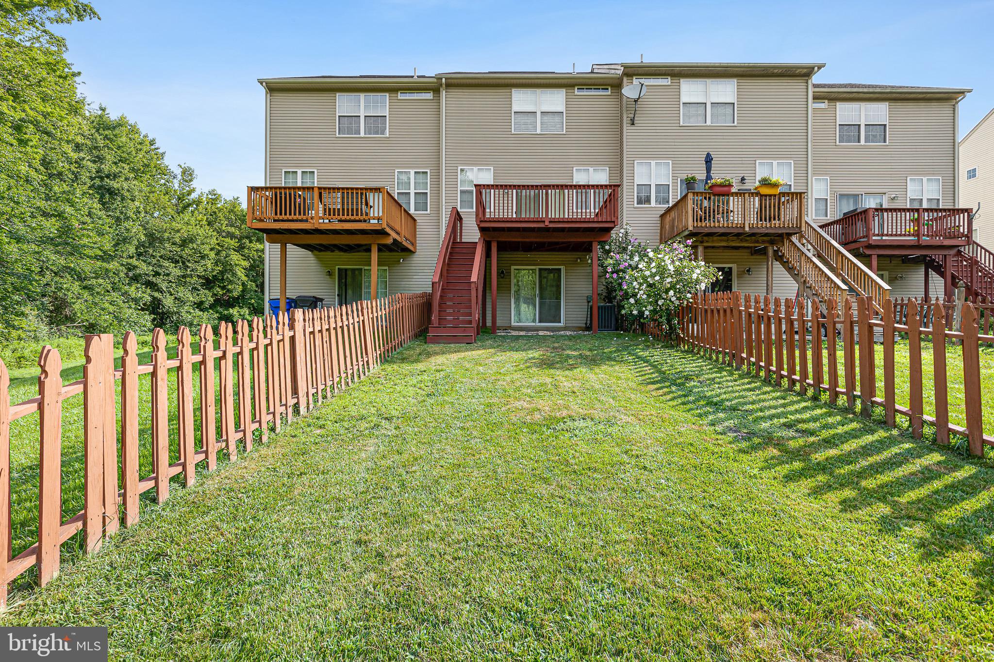32 Ballina Boulevard Bear, DE 19701 - Photo 25 of 25 a view of a house with wooden deck and furniture