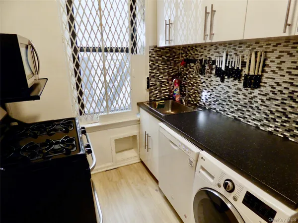 a bathroom with a sink and a shower