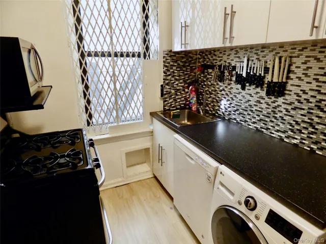 a bathroom with a sink and a shower