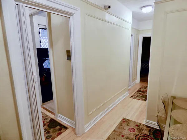 a bed room with a bed and a chair