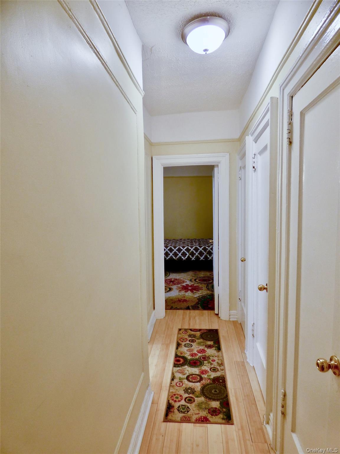 941 Jerome Avenue, Unit D5 Bronx, NY 10452 - Photo 9 of 35 a bathroom with a sink and a mirror