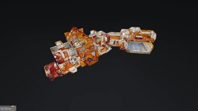 a bed sitting in a bedroom next to a lamp