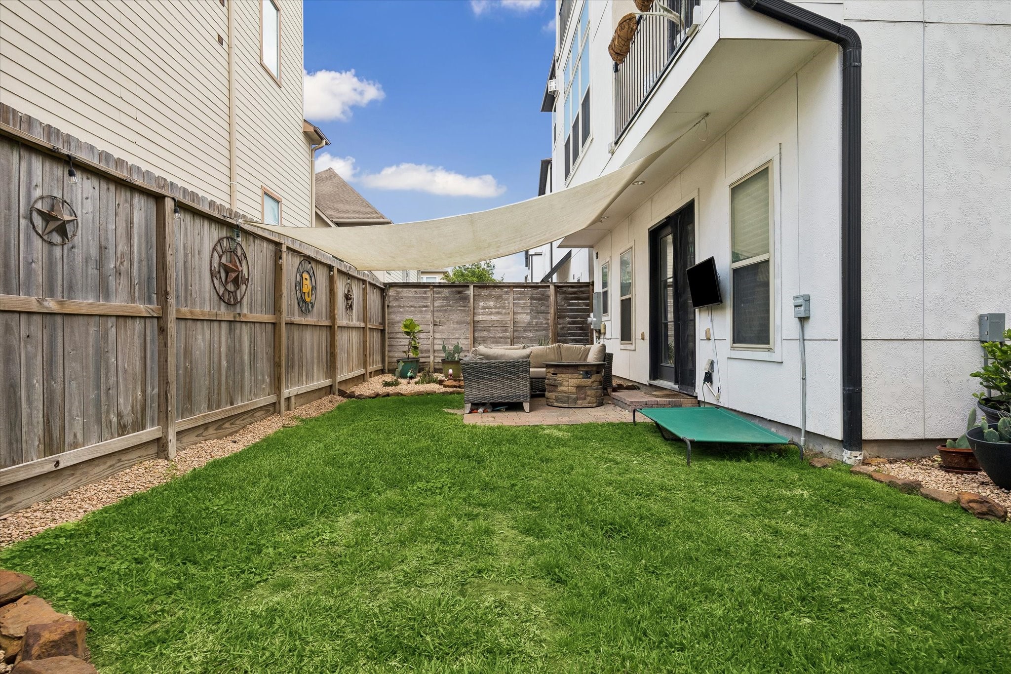 2703 Arabelle Grove Houston, TX 77007 - Photo 1 of 37 a view of backyard with patio