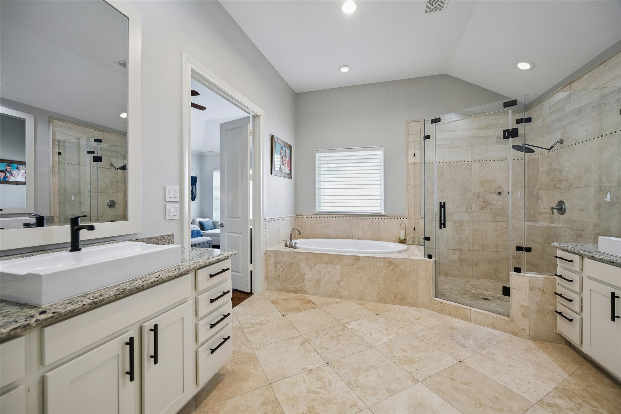 2703 Arabelle Grove Houston, TX 77007 - Photo 17 of 37 The primary bath features two sinks