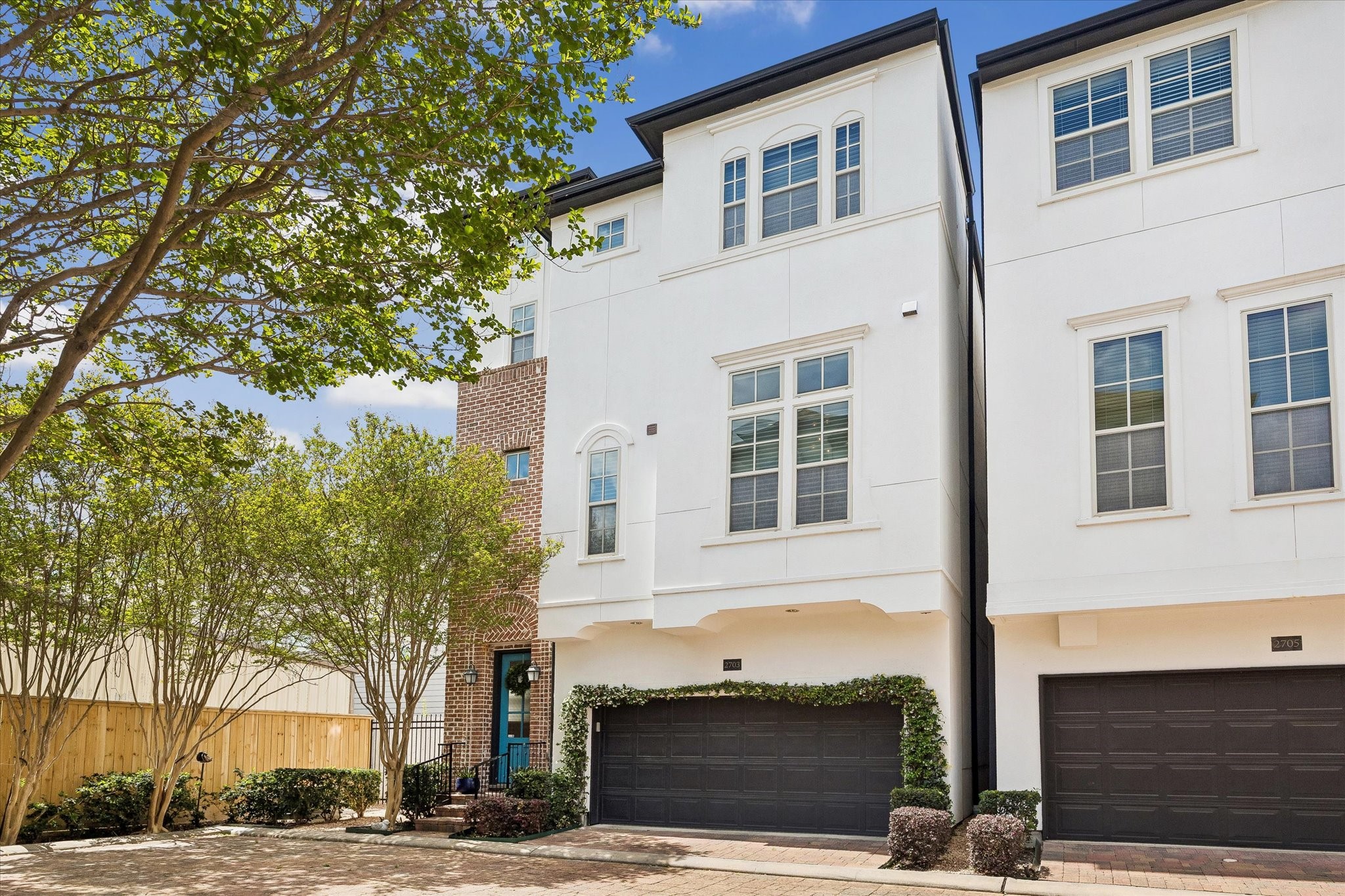 2703 Arabelle Grove Houston, TX 77007 - Photo 28 of 37 End unit features great natural light and additional parking out front
