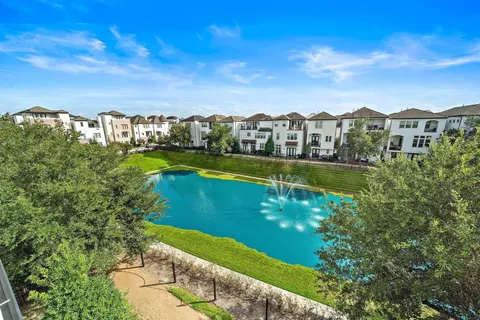 a view of a lake with a big yard